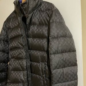 This is a very stylish Gucci jacket,XL. Has Gucci print all over jacket.